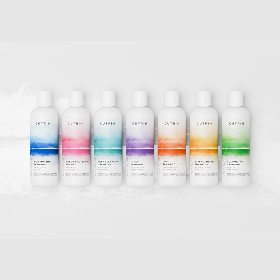 Cutrin Ainoa shampoo range, seven variants colour-coded by watercolour band